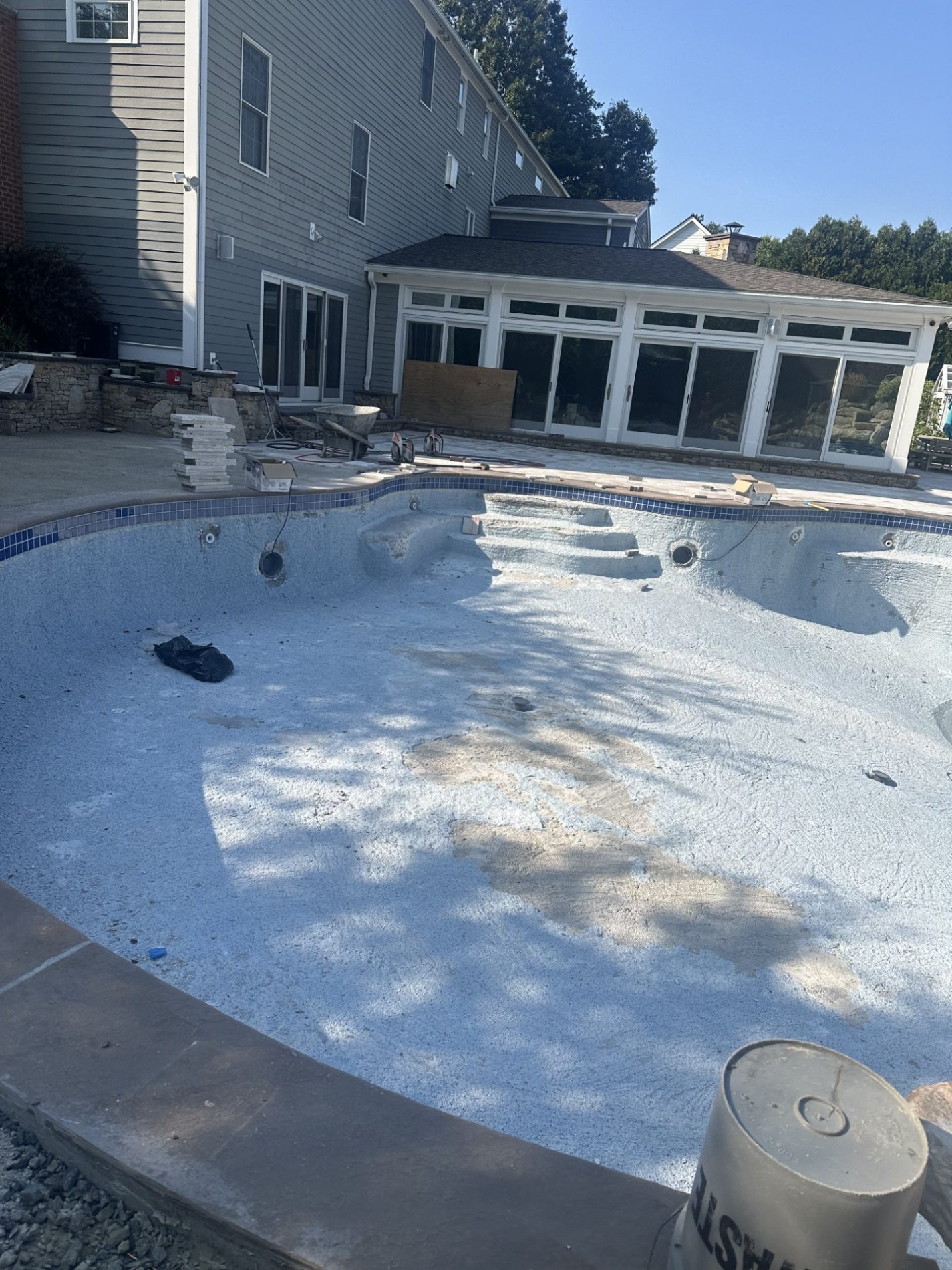 Gunite swimming pool prepared for renovation and new interior finish
